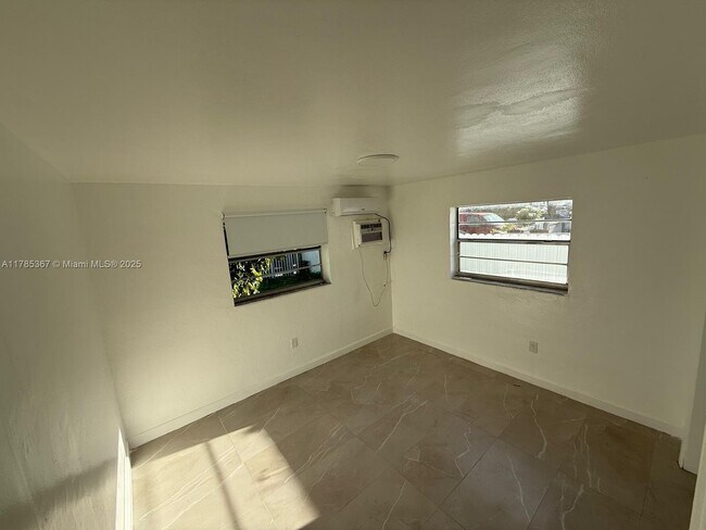 Building Photo - 2400 NW 25th Ave