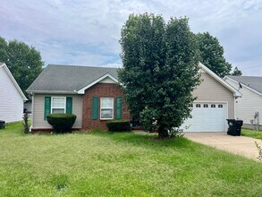 Building Photo - 3 bed, 2 Bath, Garage + Screened Back Porch, Near Cason Ln