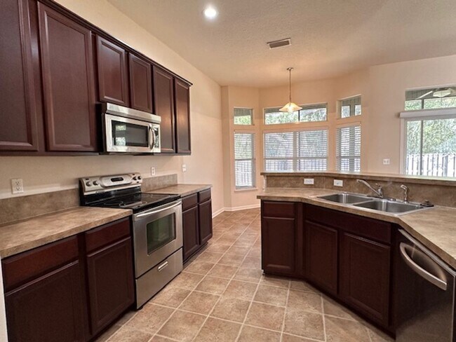 Building Photo - A Must See! Large 3BD/2BA, Fully Fenced Yard