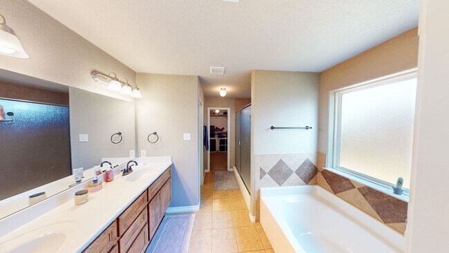 Building Photo - LIMITED-TIME MOVE-IN SPECIAL: Two Weeks Free Rent! Spacious 3 Bedroom, 2 Full Bath, with Attached...