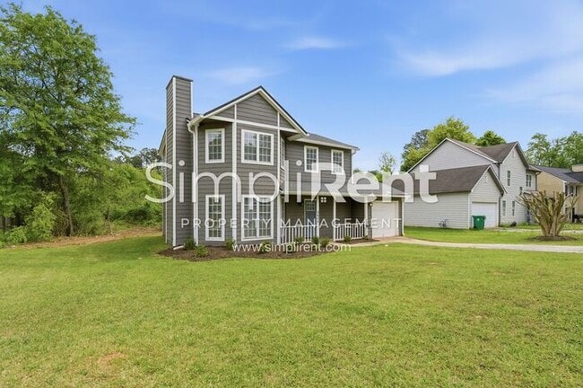 Building Photo - Updated Home with Spacious Layout & Private Backyard