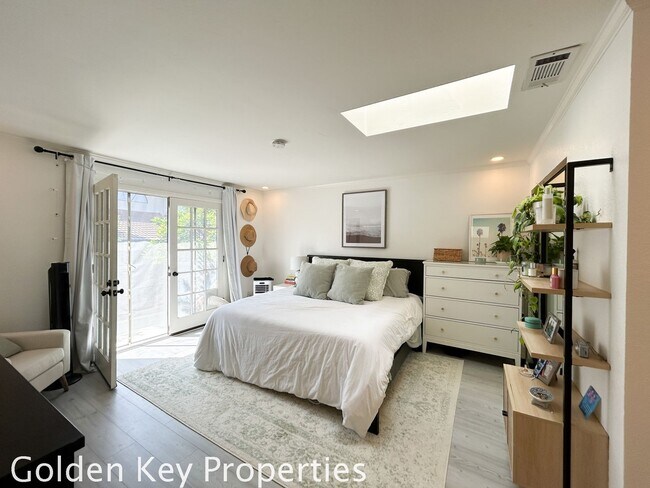 Building Photo - Welcome to this stunning ***unfurnished*** tri-level condo in the desirable Casitas de la Costa c...