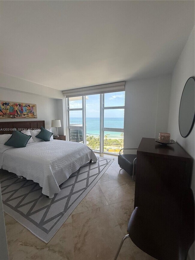 Building Photo - 10275 Collins Ave