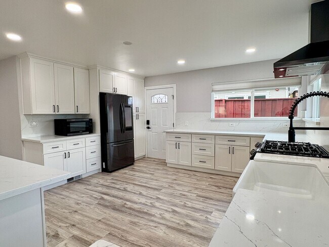 Building Photo - Stunning 4BR/3BA Home + Detached Studio in...