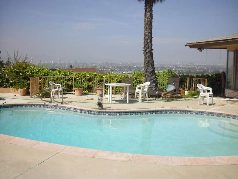 Overlooking the pool to the city view. - 3903 Carol Court