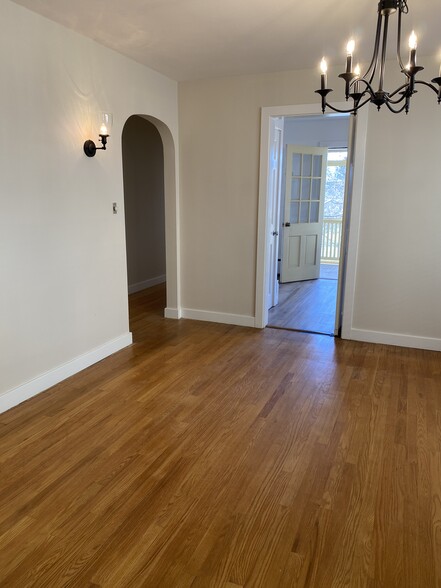 Dining room looking into kitchen then porch - 138 Willis St