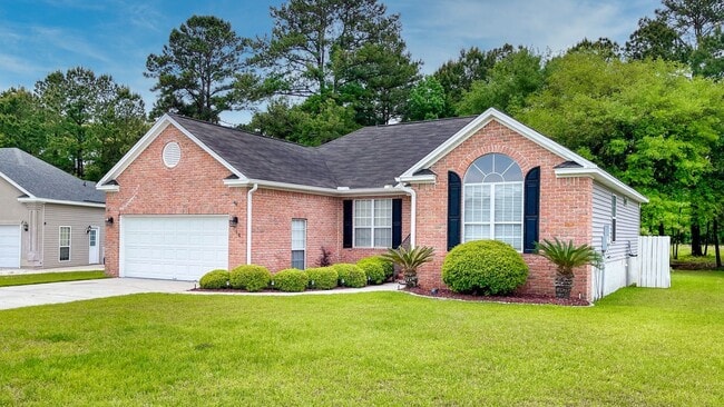 Building Photo - 4 Bedrooms, 2 Bathrooms in the Heart of Ri...