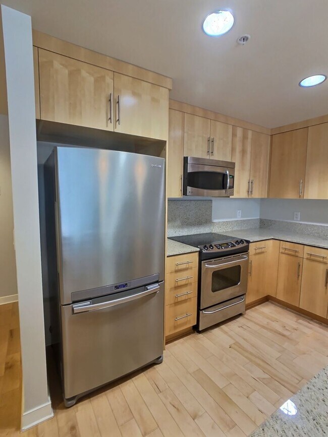 Building Photo - Luxury 1 Bedroom Condo at Axis – with Outdoor Patio Space!