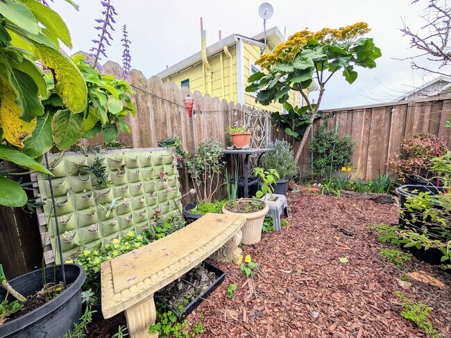 Building Photo - Charming remodeled lower unit with amazing yard and laundry