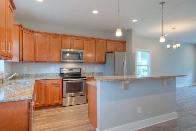 Building Photo - Uptown Village- 3 BR 3.5 Bath Townhome
