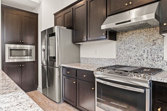 Building Photo - Sun-Filled Corner 4BR w/ Dual Yards & Panoramic Indoor-Outdoor Flow