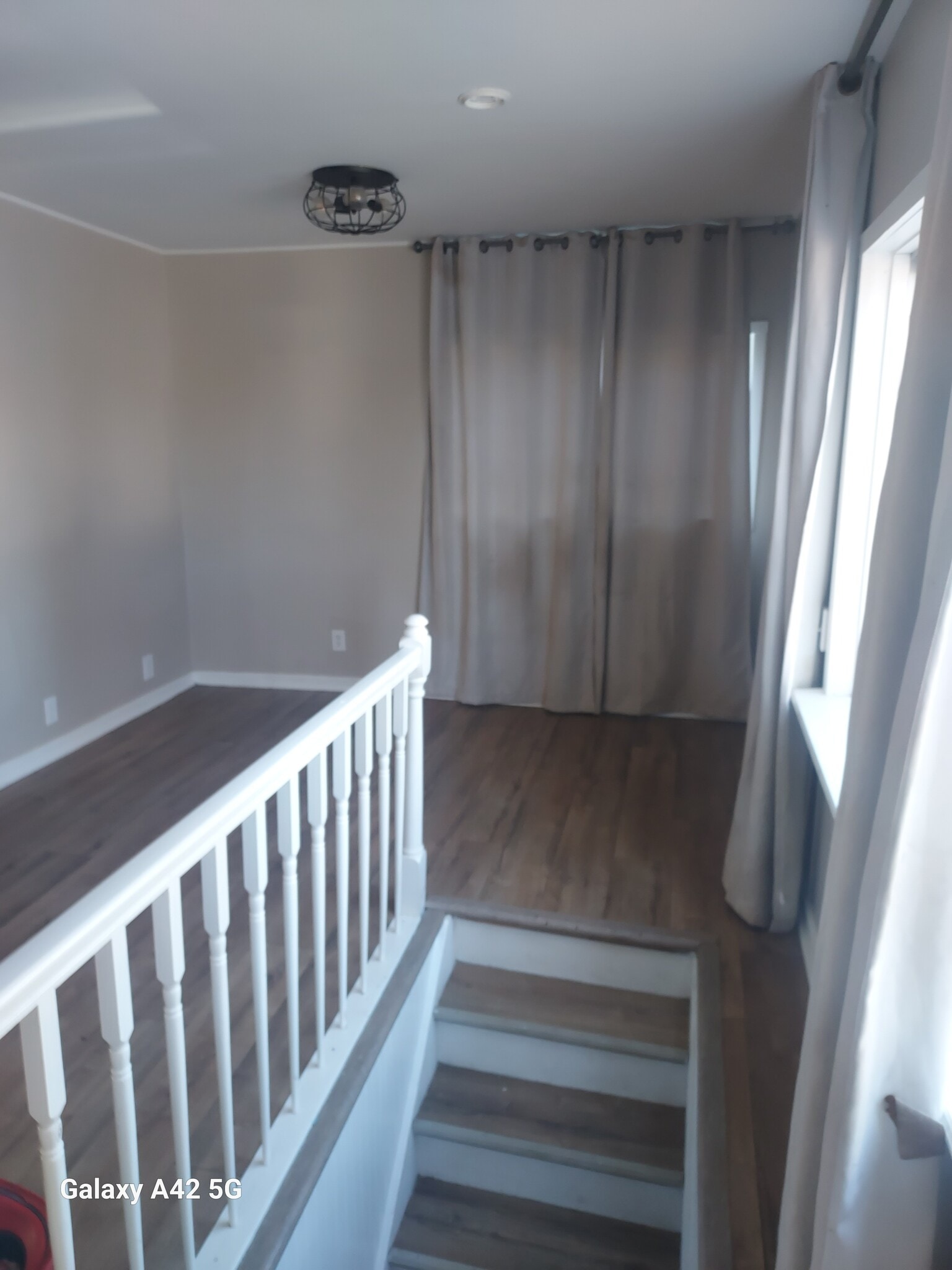 Stairway from living room upstairs to basement - 835 W Wyeth St