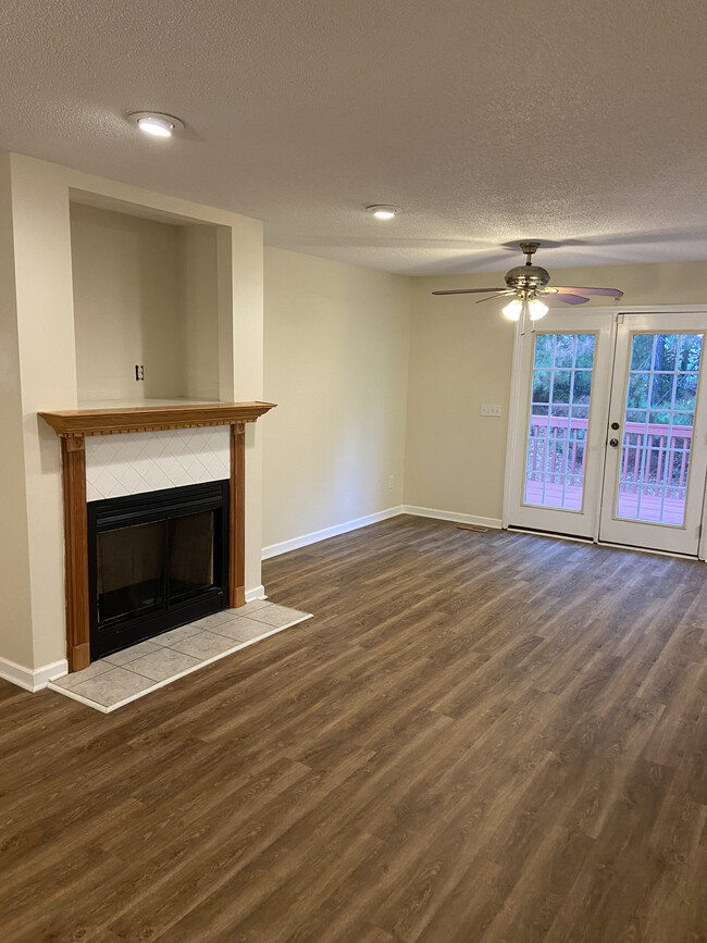 TV space above fireplace - 1309 Ujamaa Dr