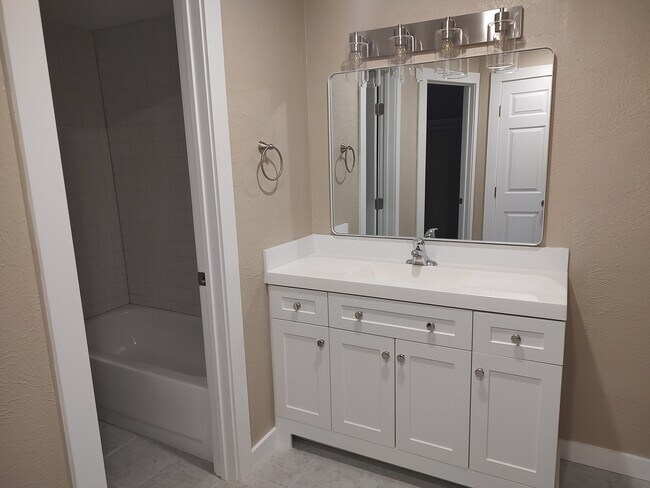 master vanity - 113 NW Main St