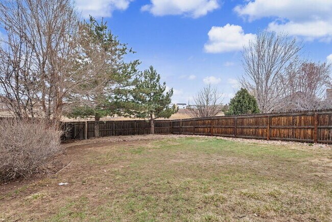 Building Photo - Spacious 5-Bedroom Home Backing to Open Space with Mountain Views