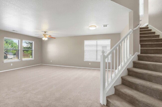 Building Photo - "Spacious 4-Bedroom Sanctuary with 3 Full Baths and Solar Panels!"