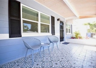 Front screened porch entry - 658 64th Ave S