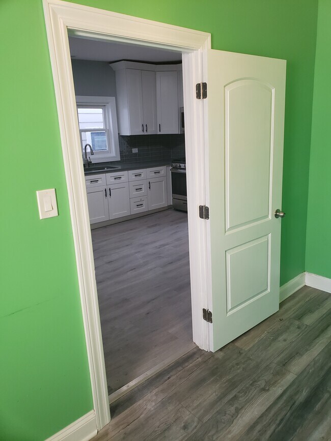 Rear bedroom to kitchen view - 3703 S Lowe Ave