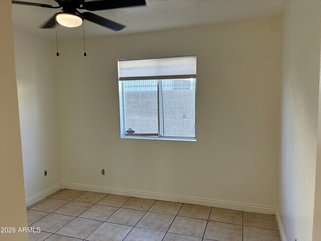 Building Photo - 8819 W Roma Ave