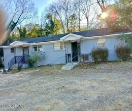 Building Photo - 3908 Log Cabin Dr