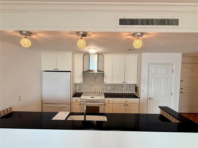 Building Photo - 750 N Tamiami Trl