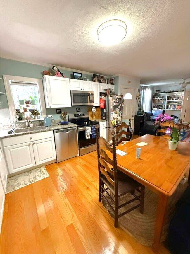 Building Photo - Spacious and updated 3-bedroom condo just 2 blocks from Airport T Station!