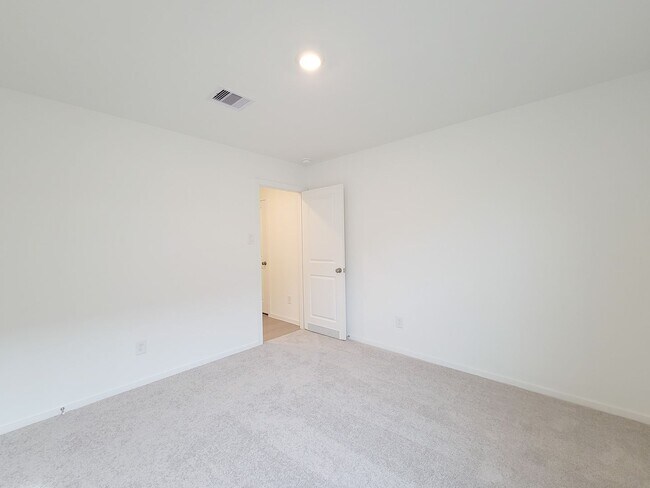 Building Photo - This great new single-story design makes smart use of the space available. At the front are all t...