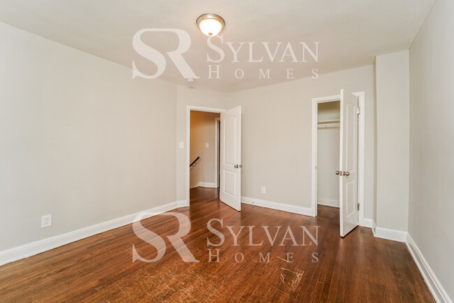 Building Photo - Welcome to this charming abode.