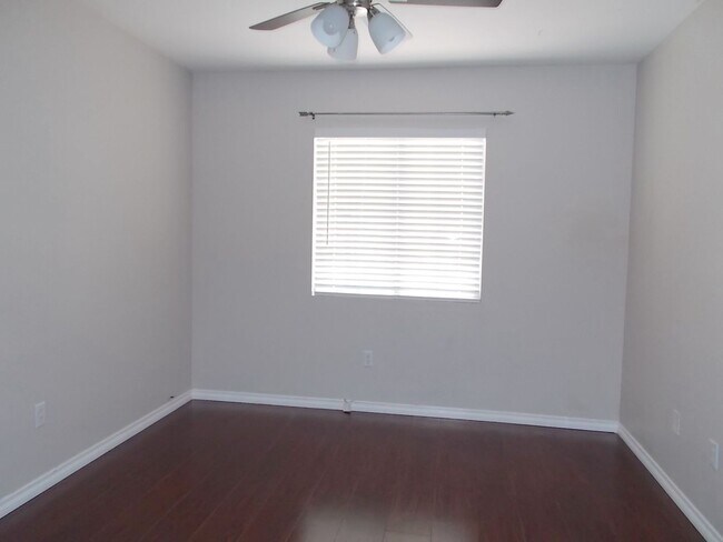 Building Photo - Spacious 4-Bedroom Home with Pool & 3-Car ...