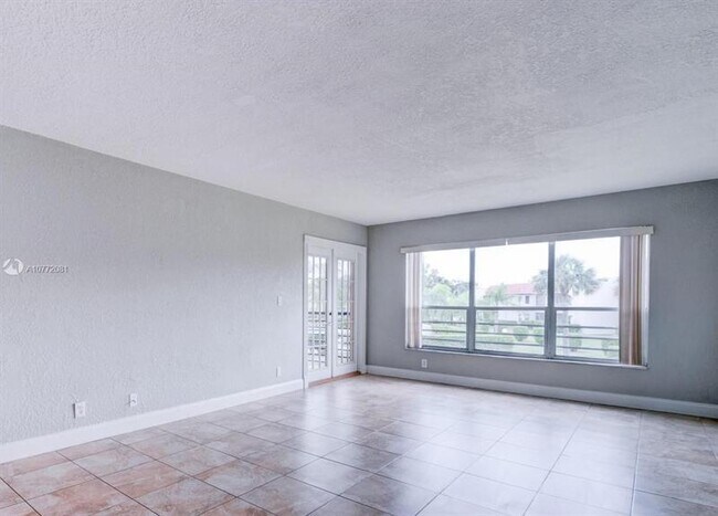 Building Photo - 7435 Woodmont Ter