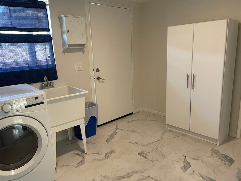 Laundry room linen cabinet - 22947 San Vicente Rd