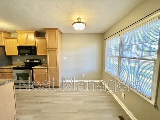 Building Photo - 6928 Bostick Dr