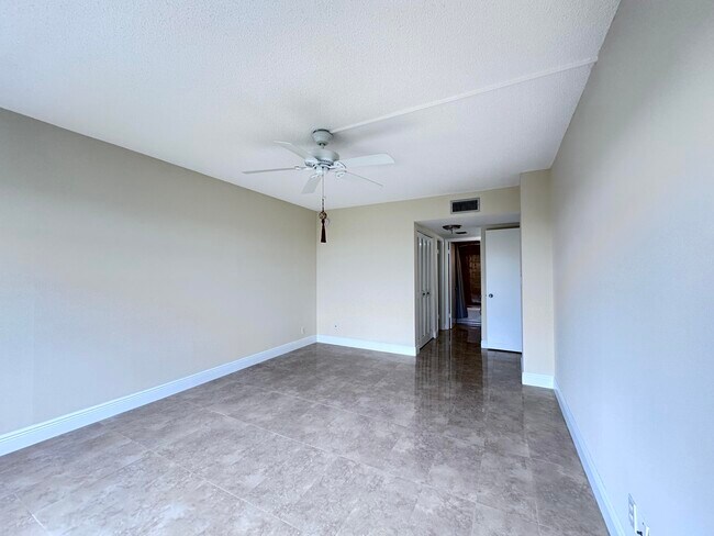 Building Photo - 10777 W Sample Rd