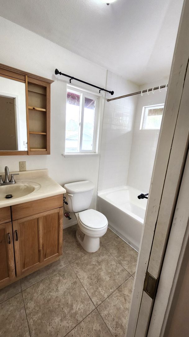 Building Photo - Ah Puck, Jordanah &amp; Tyson