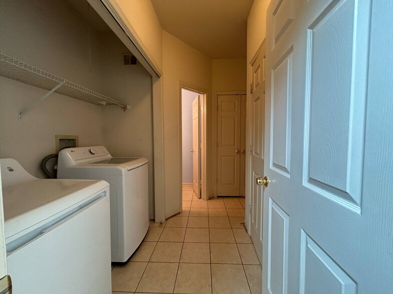 Laundry on main level - 5556 Village Center Dr