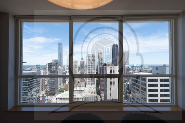 Building Photo - Stunning 46th Floor, 2 bedroom condo, righ...