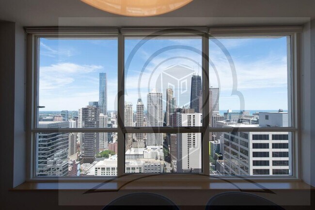 Building Photo - Stunning 46th Floor, 2 bedroom condo, right on the Chicago River