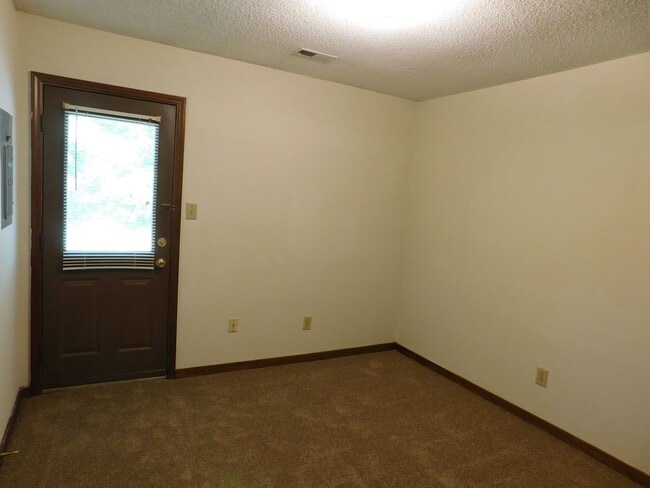 Building Photo - 2 Bedrooms, 1 bathroom Cathedral ceiling i...