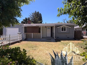 Building Photo - Charming 2 Bedroom Home with Large Backyard & Garage