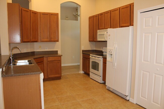 Building Photo - Lovely Rental in Coral Trace