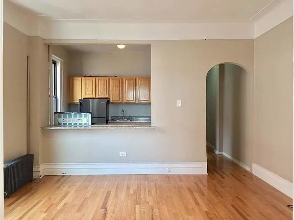 Building Photo - "Charming 1-Bedroom Retreat in Vibrant New York Locale – Your Perfect Urban Sanctuary!"