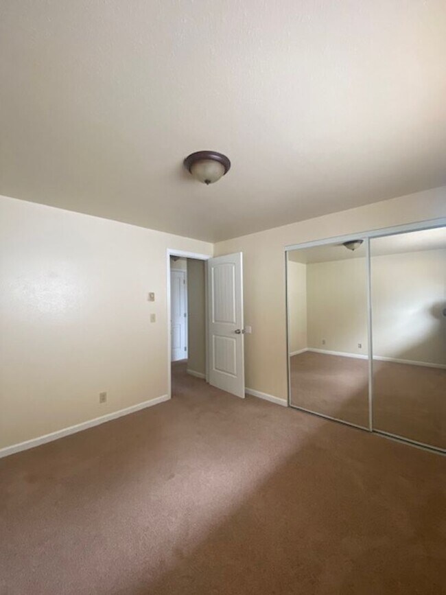 Building Photo - Recently Remodeled Two Bedroom Apartment With Canal Views and Private Balcony!