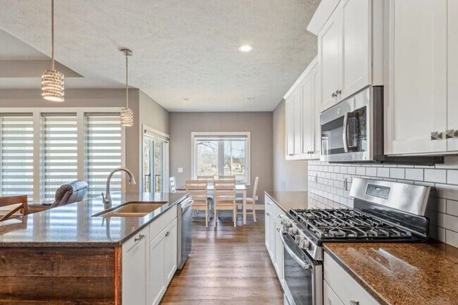 Building Photo - Waterfront Home in Buccaneer Bay with 3-Car Garage & Walkout Basement