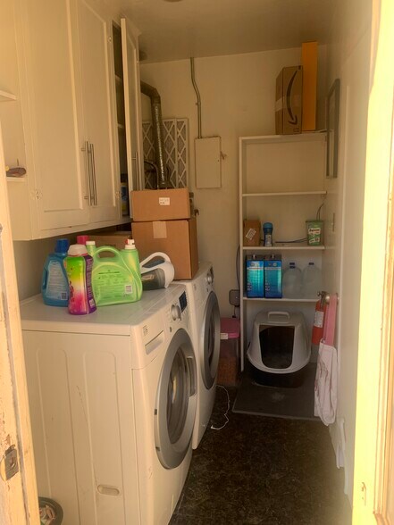 Laundry room off of kitchen. - 393 Coronado St