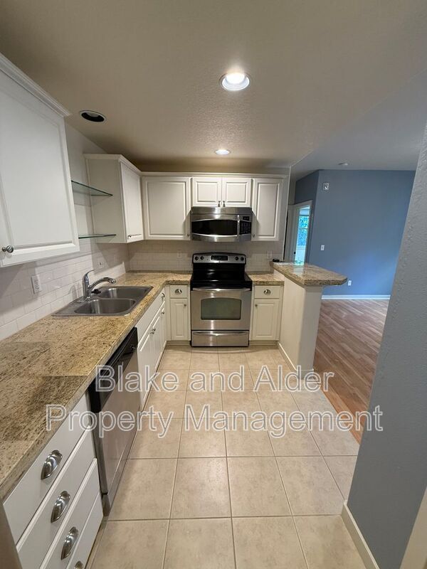 Building Photo - 8758 NE Delamere Way