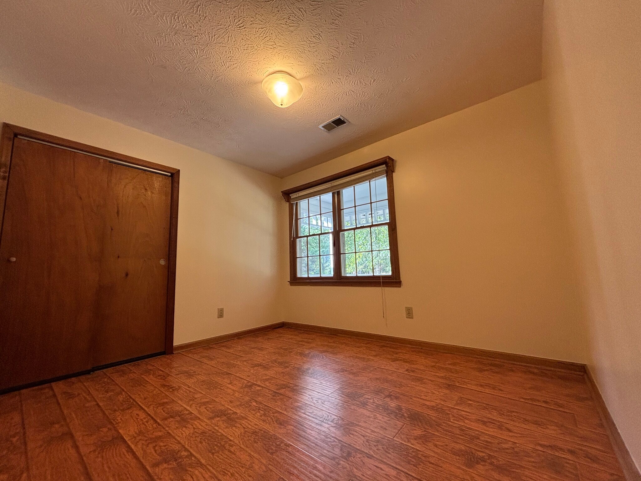 Bedroom 1 is spacious. - 705 Alcovy Forest Dr