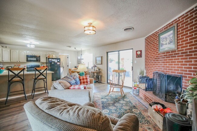 Building Photo - Three Bedroom Home with Plush Backyard