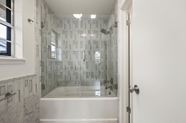 Building Photo - Modern Details and Interiors to a sought-a...