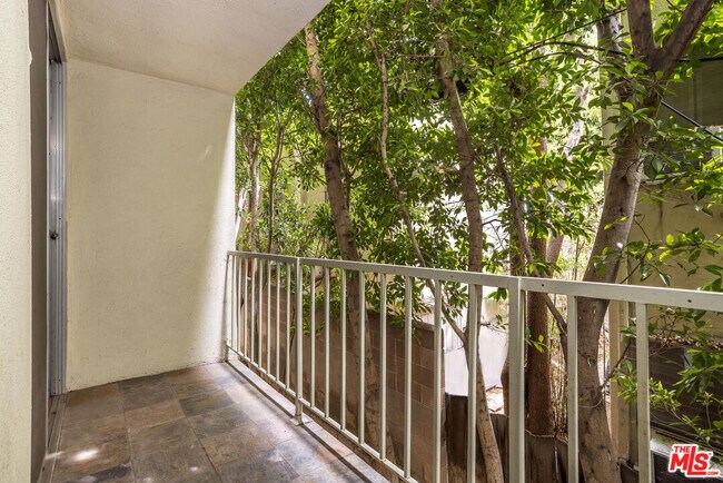 Building Photo - 1230 N Sweetzer Ave