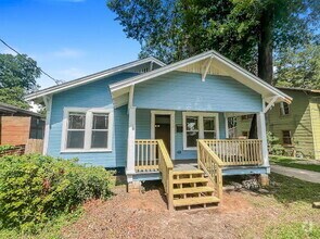 Building Photo - "Charming MIDTOWN 2-Bedroom Home with Glea...
